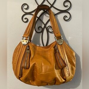 100% Genuine Leather Hand purse by B.Makowsky. Like new.